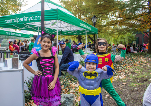 Kids wearing Halloween costumes
