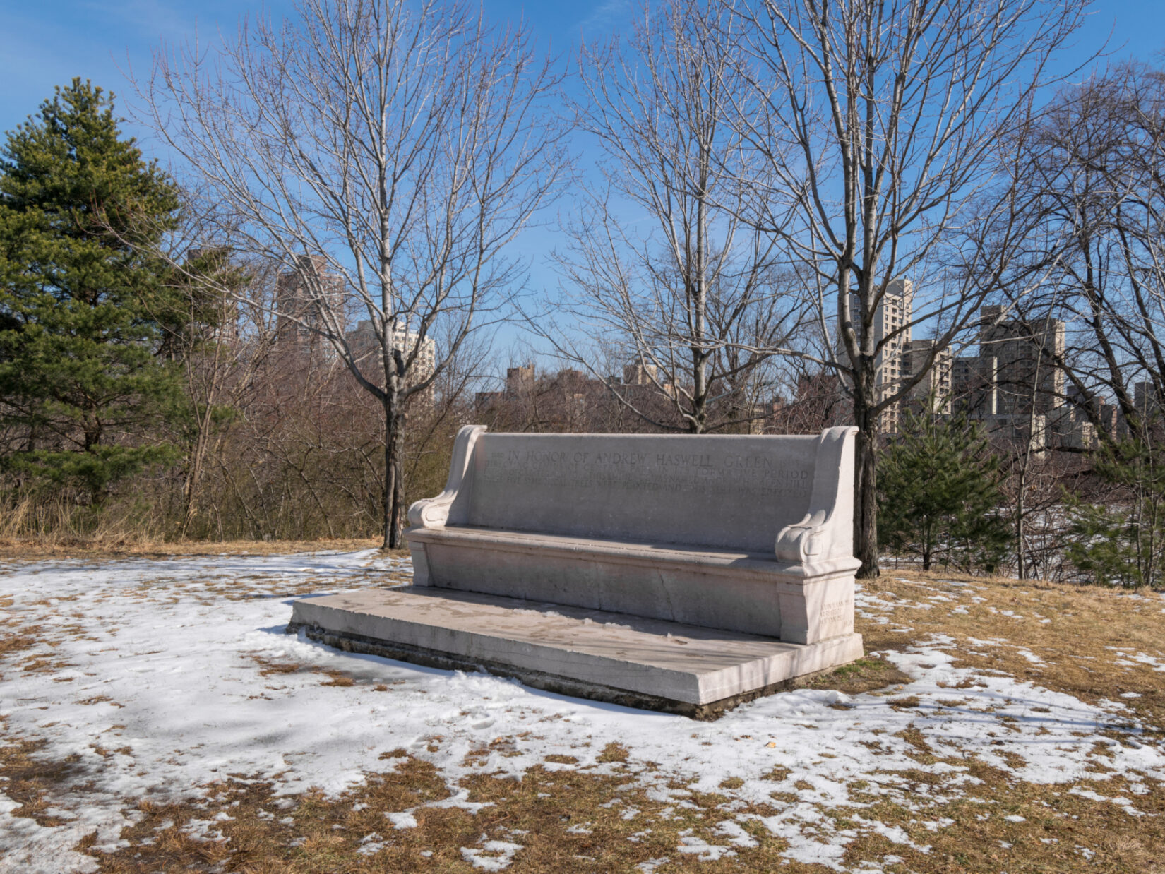 The landscape of Fort Fish, featuring the Andrew Haskell Green bench