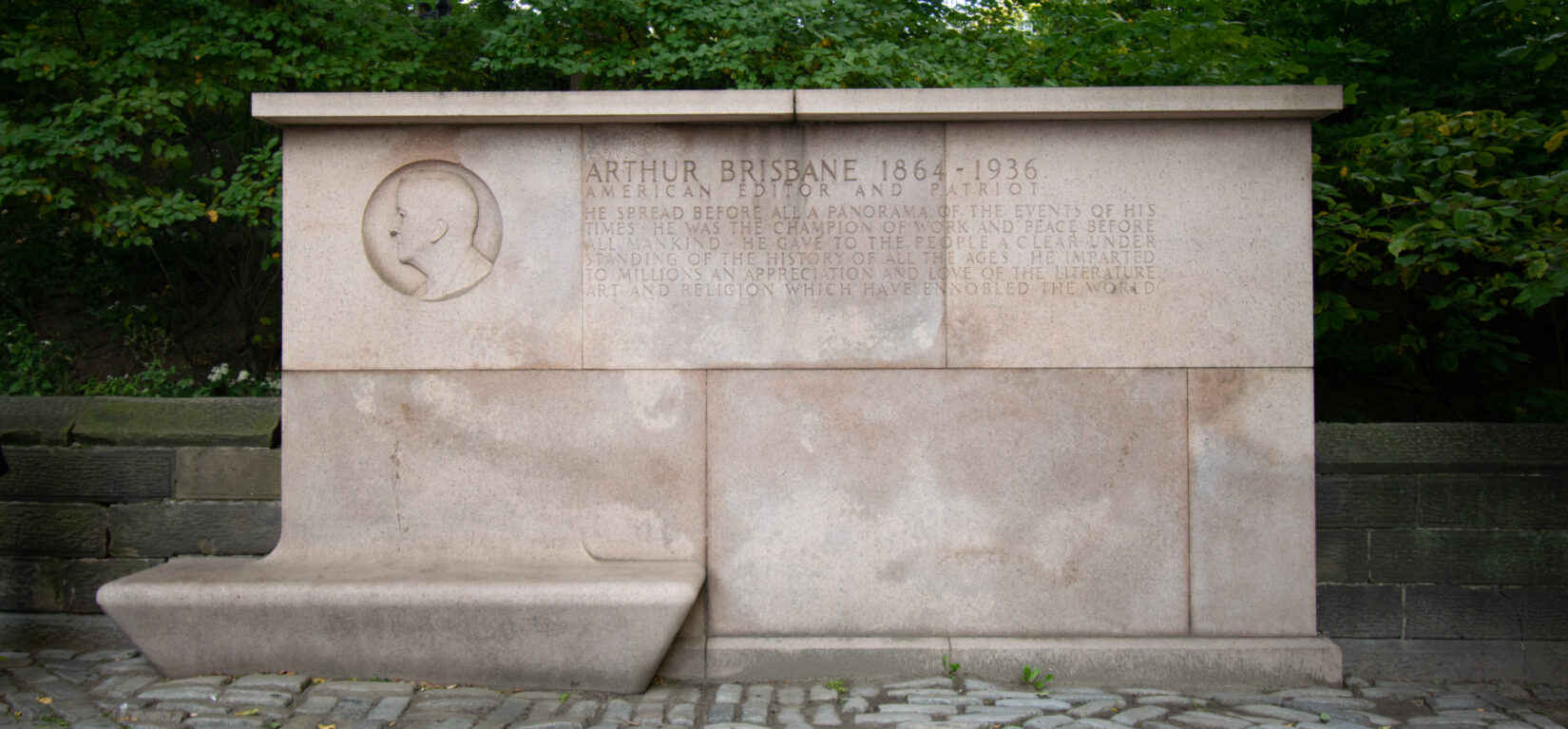 The memorial sits along the wall on the perimeter