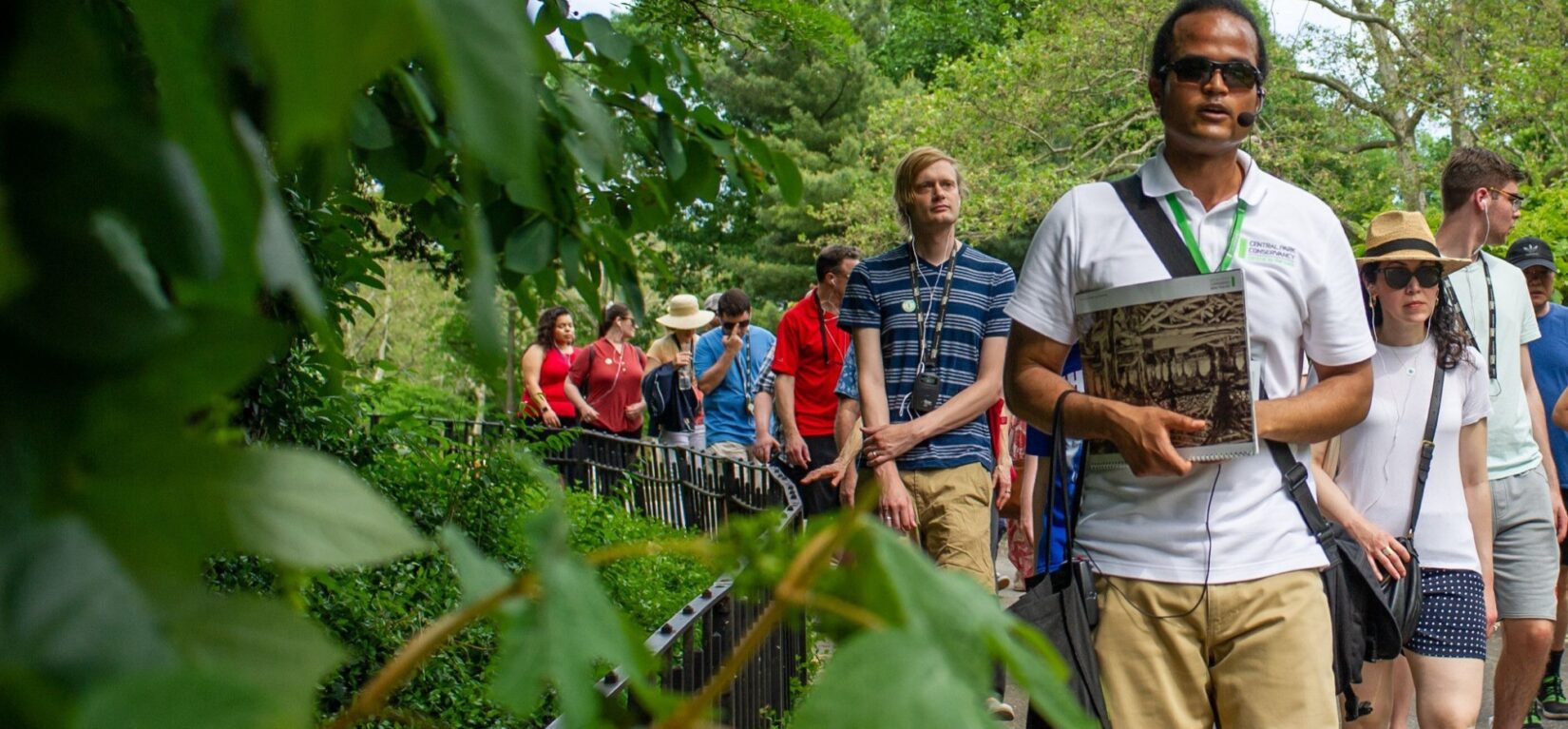 A Conservancy tour guide leads park goers on a tour through the southern end of the Park.