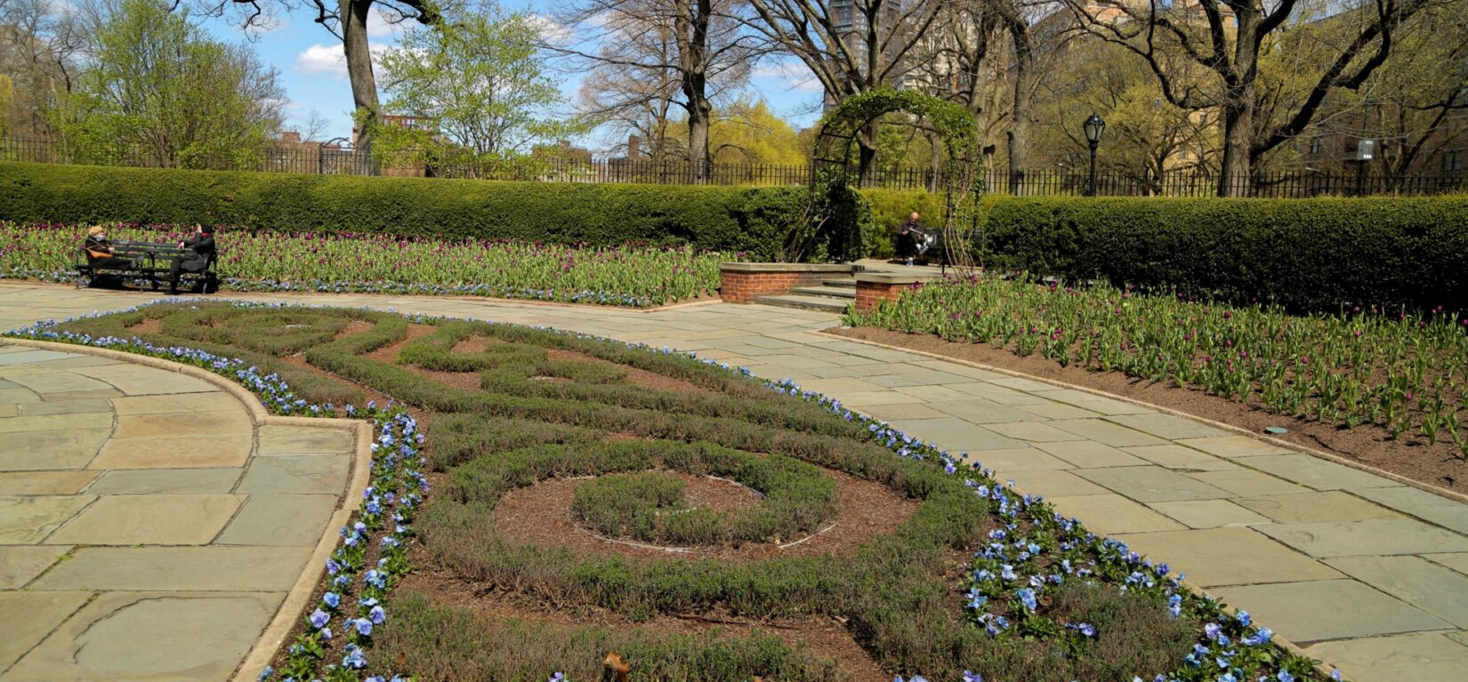 A manicured flower bed in early spring