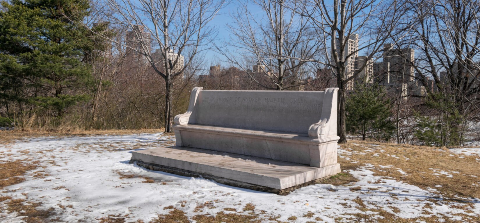 The landscape of Fort Fish, featuring the Andrew Haskell Green bench