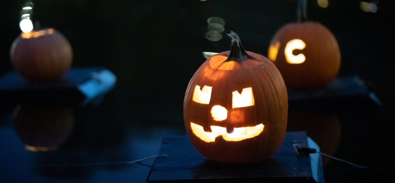 Night view of the Halloween Pumpkin Flotilla on the Harlem Meer