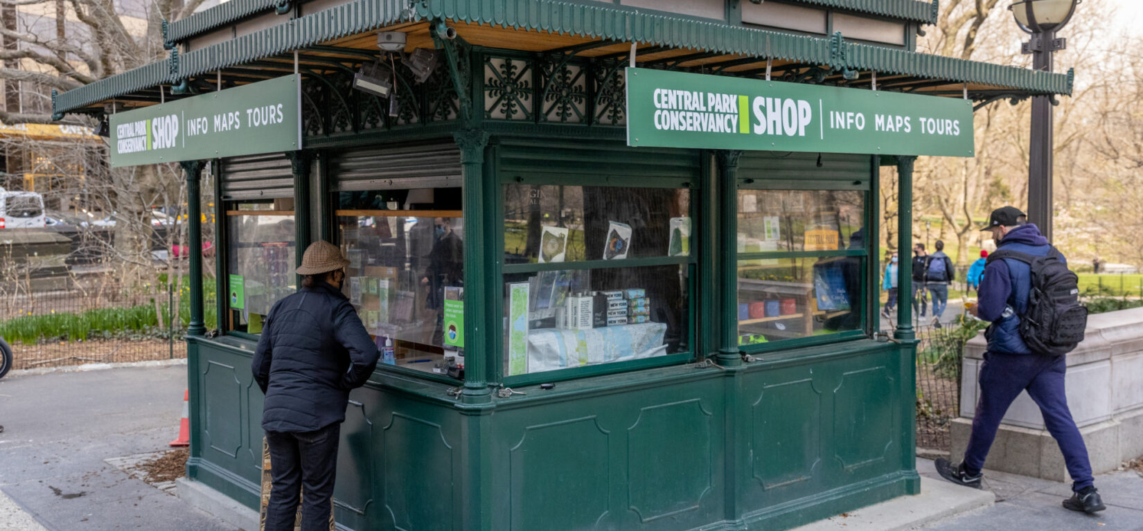 The kiosk is shown in very early spring.