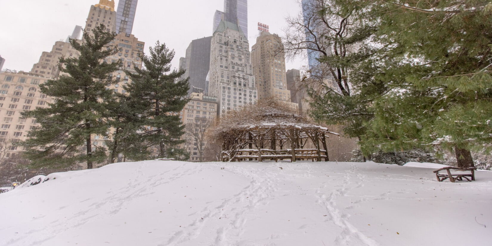 The rustic structure, Cop Cot, under a layer of snow