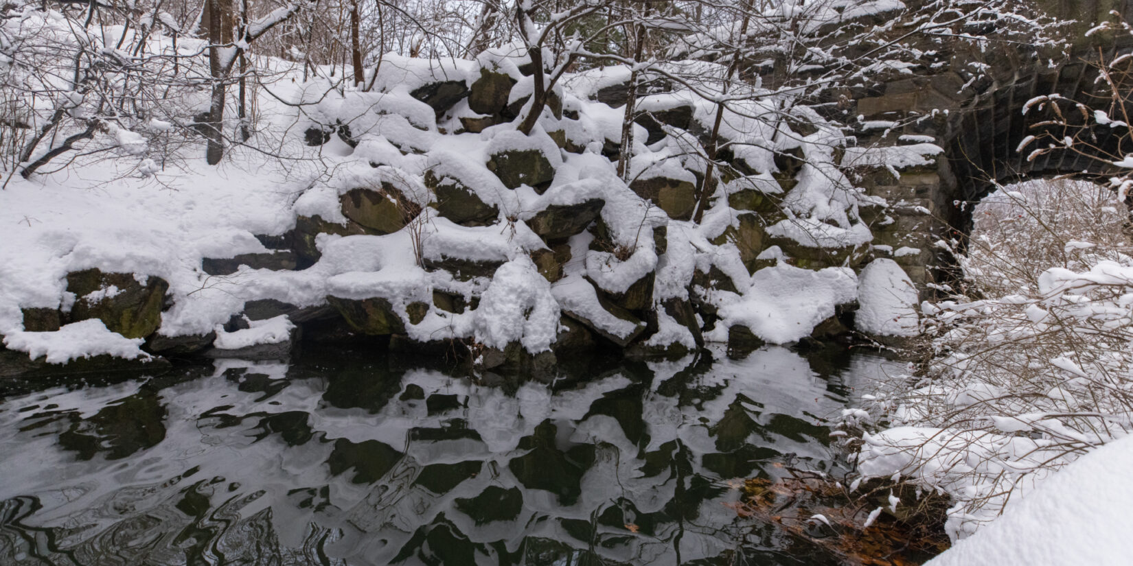 The natural beauty of ice and snow, reflected in the Loch