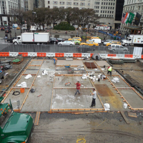 Construction workers restoring the Plaza