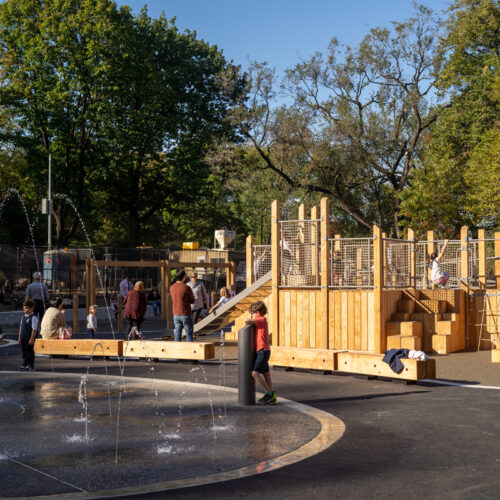 A boy circles the water feature, after reconstruction